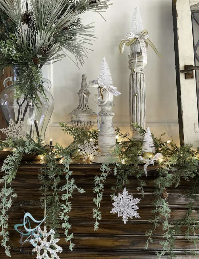 Winter decor on a fireplace mantel