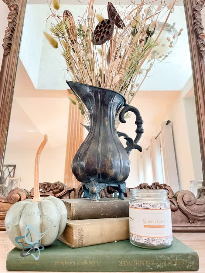 entryway table decorated for fall