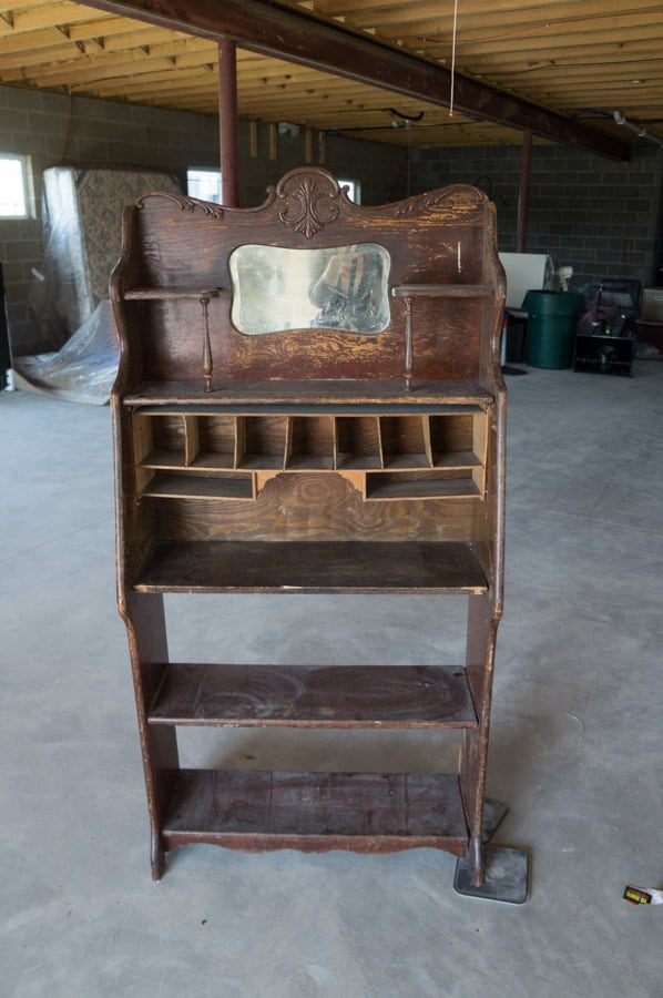 old antique secretary desk missing the fold down desk ledge.