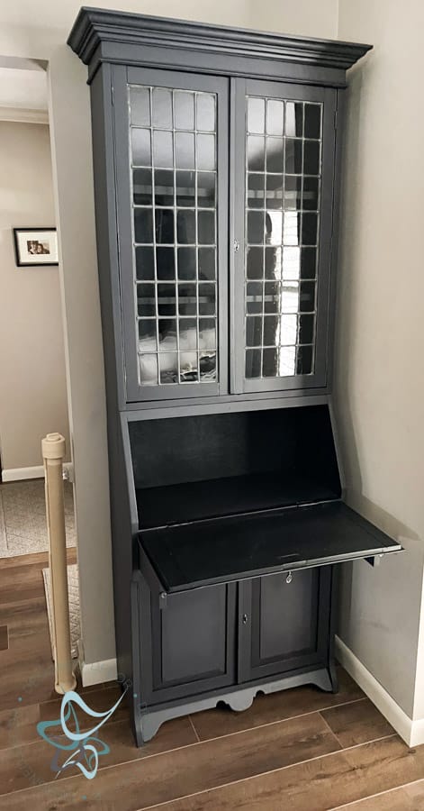 secretary desk painted in a dark gray