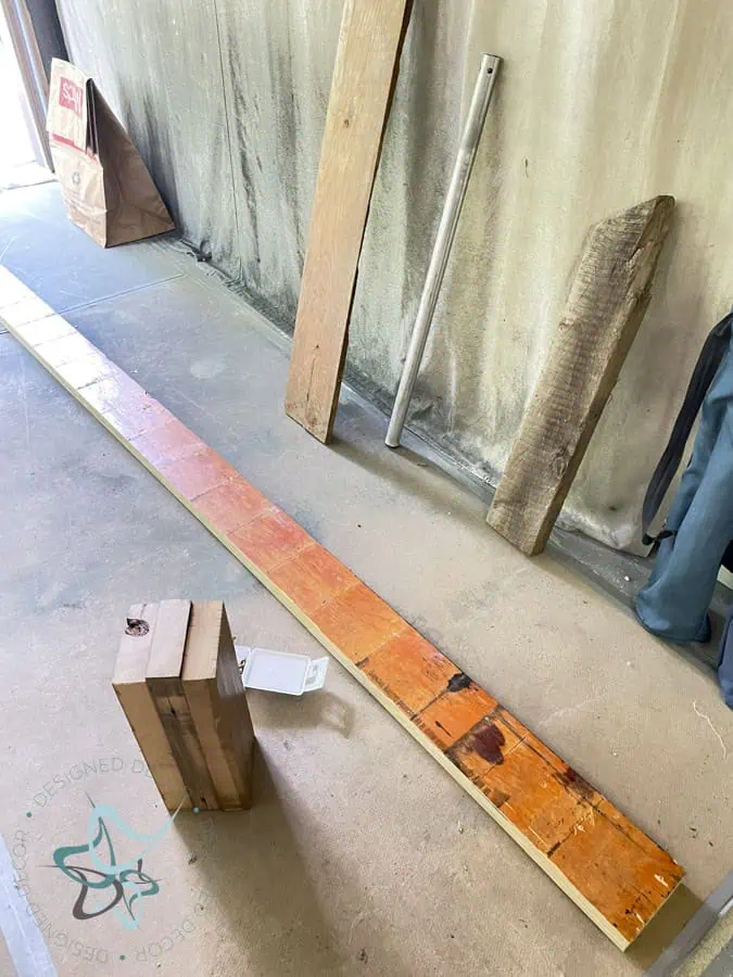 used wood lying on garage floor